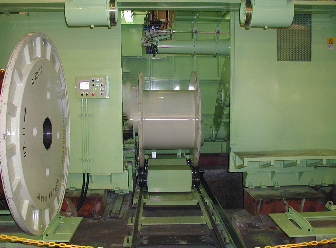 SINGLE TWIST BUNCHER WITH AUTOMATIC DRUM EXCHANGE SYSTEM